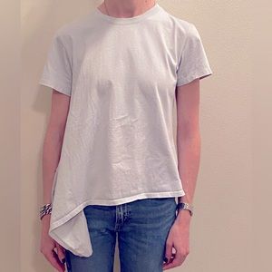 JW Anderson for Uniqlo pale blue tshirt with asymmetrical hem